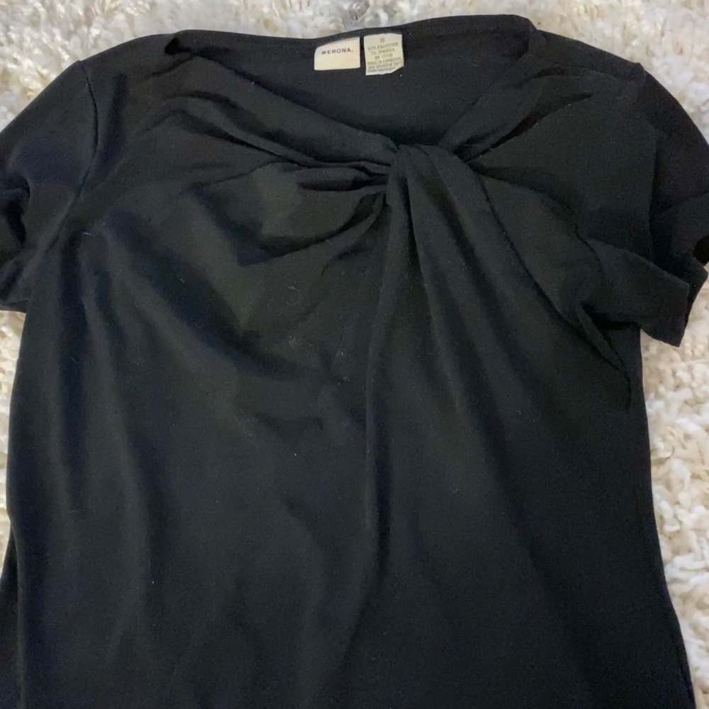 Black blouse with knot design. Size: small